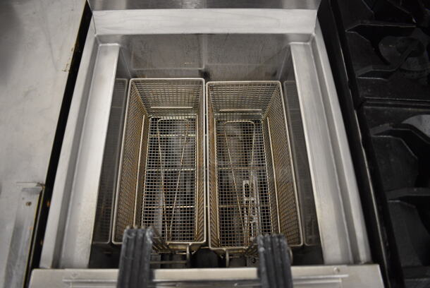 BEAUTIFUL! 2018 Henny Penny Model OFG-321 Stainless Steel Commercial Floor Style Natural Gas Powered Deep Fat Fryer w/ 2 Metal Fry Baskets on Commercial Casters. 85,000 BTU. 17x34x44 - Image 3 of 7
