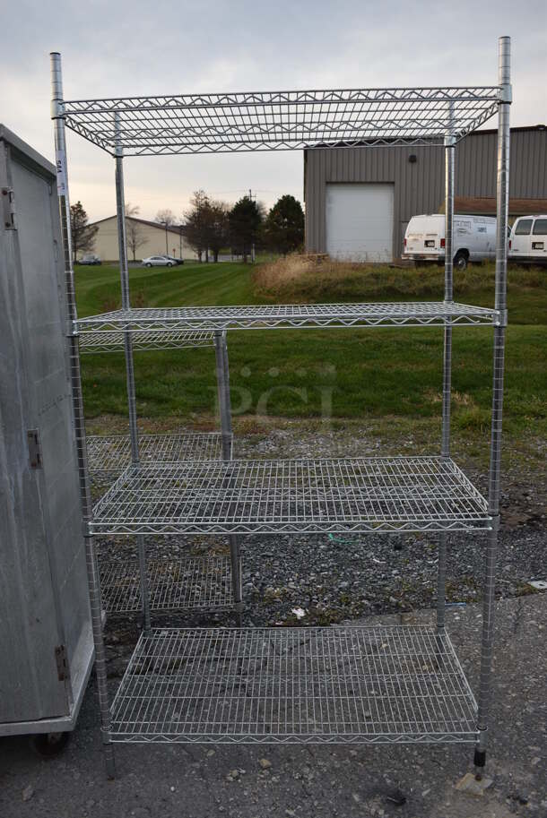 Chrome Finish 4 Tier Metro Style Shelving Unit. BUYER MUST DISMANTLE. PCI CANNOT DISMANTLE FOR SHIPPING. PLEASE CONSIDER FREIGHT CHARGES. 42x24x75 - Image 1 of 4