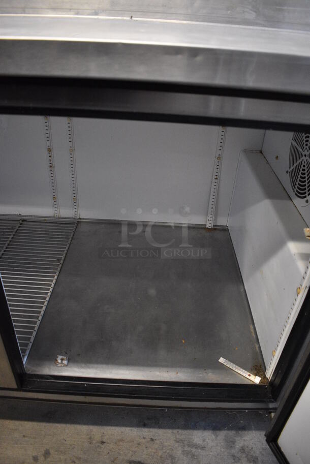 NICE! True Model TPP-67 Stainless Steel Commercial Pizza Prep Table on Commercial Casters. 115 Volts, 1 Phase. 67x33x42. Tested and Working! - Image 11 of 12