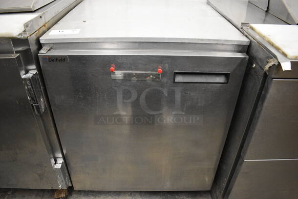 NICE! 2012 Delfield Model 407CA-DHL Stainless Steel Commercial Single Door Undercounter Cooler on Commercial Casters. 115 Volts, 1 Phase. 27x28x34. Tested and Does Not Power On - Image 1 of 5