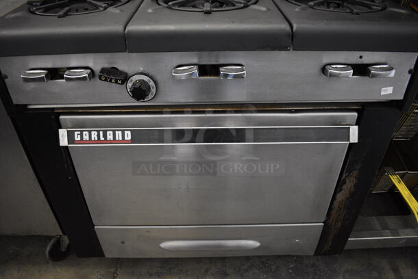 WOW! Garland Metal Commercial Gas Powered 6 Burner Range w/ Lower Oven and Stainless Steel Overshelf. 36x31x60 - Image 3 of 6