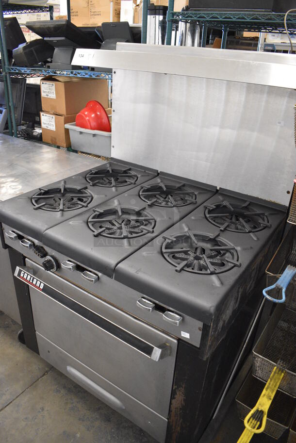 WOW! Garland Metal Commercial Gas Powered 6 Burner Range w/ Lower Oven and Stainless Steel Overshelf. 36x31x60 - Image 4 of 6