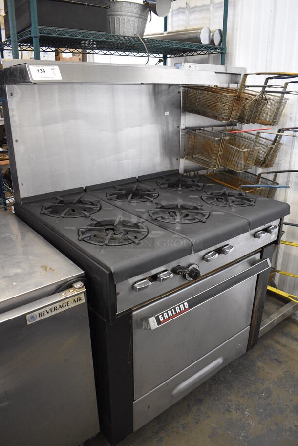 WOW! Garland Metal Commercial Gas Powered 6 Burner Range w/ Lower Oven and Stainless Steel Overshelf. 36x31x60 - Image 5 of 6
