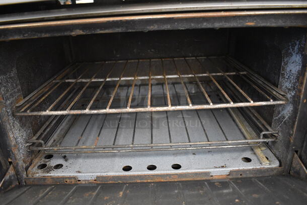 WOW! Garland Metal Commercial Gas Powered 6 Burner Range w/ Lower Oven and Stainless Steel Overshelf. 36x31x60 - Image 6 of 6