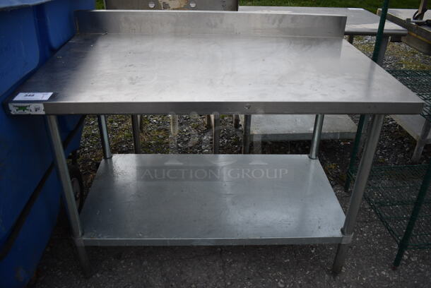 Stainless Steel Commercial Table w/ Backsplash and Metal Undershelf. 48x30x38