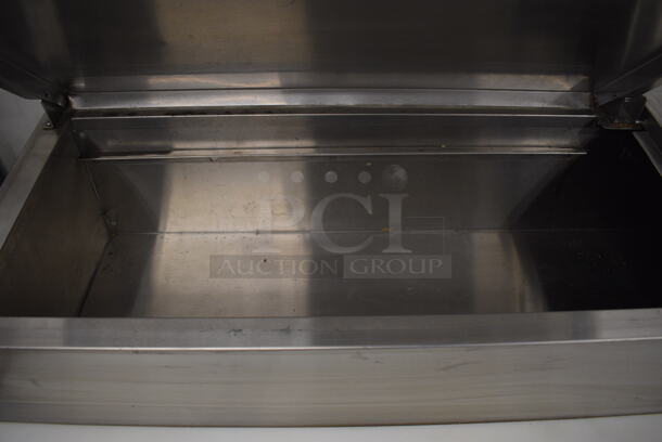 WOW! Continental Model CPT67 Stainless Steel Commercial Pizza Prep Table w/ 2 Lids and 3 Doors on Commercial Casters. 115 Volts, 1 Phase. 67x35x45. Tested and Working! - Image 5 of 11