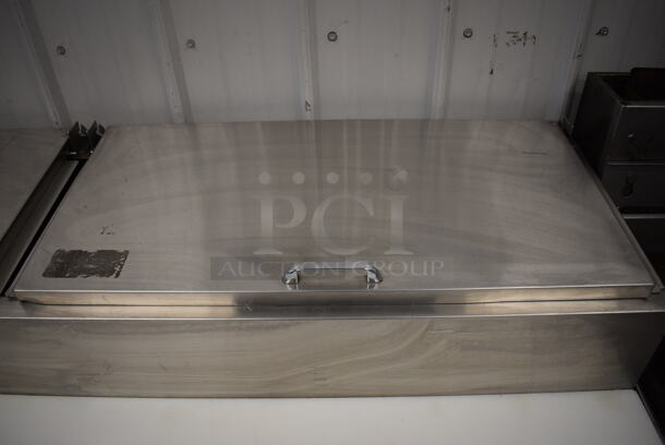 WOW! Continental Model CPT67 Stainless Steel Commercial Pizza Prep Table w/ 2 Lids and 3 Doors on Commercial Casters. 115 Volts, 1 Phase. 67x35x45. Tested and Working! - Image 6 of 11