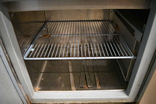 NICE! Delfield Stainless Steel Commercial Pizza Prep Table w/ Lid and 2 Doors. 60x30x40. Tested and Powers On But Temps at 64 Degrees - Image 7 of 8