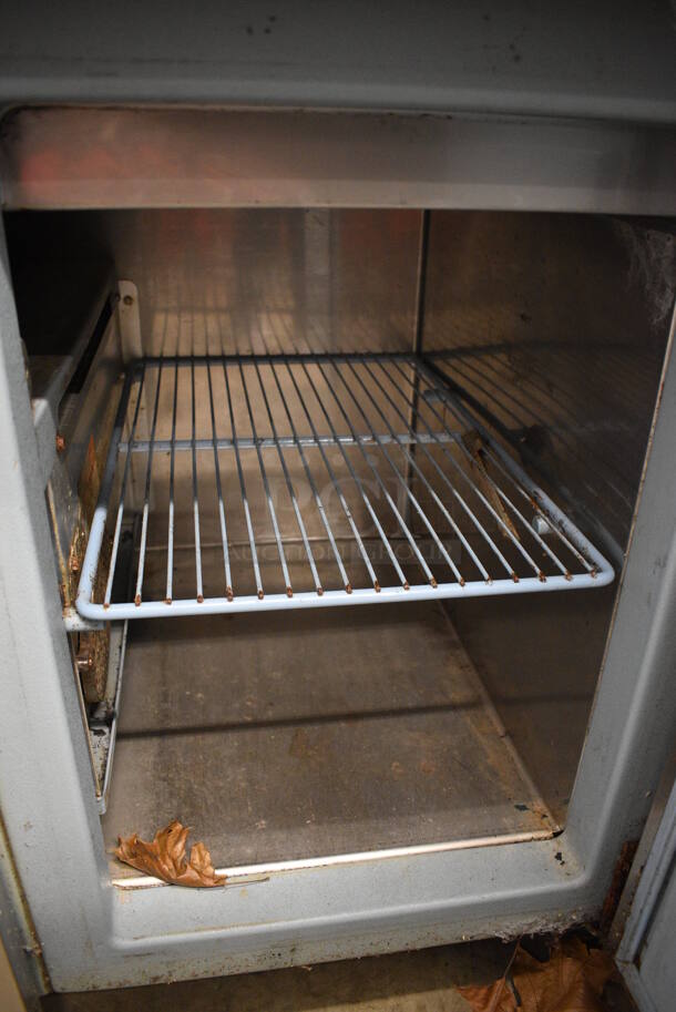 NICE! Delfield Stainless Steel Commercial Pizza Prep Table w/ Lid and 2 Doors. 60x30x40. Tested and Powers On But Temps at 64 Degrees - Image 8 of 8