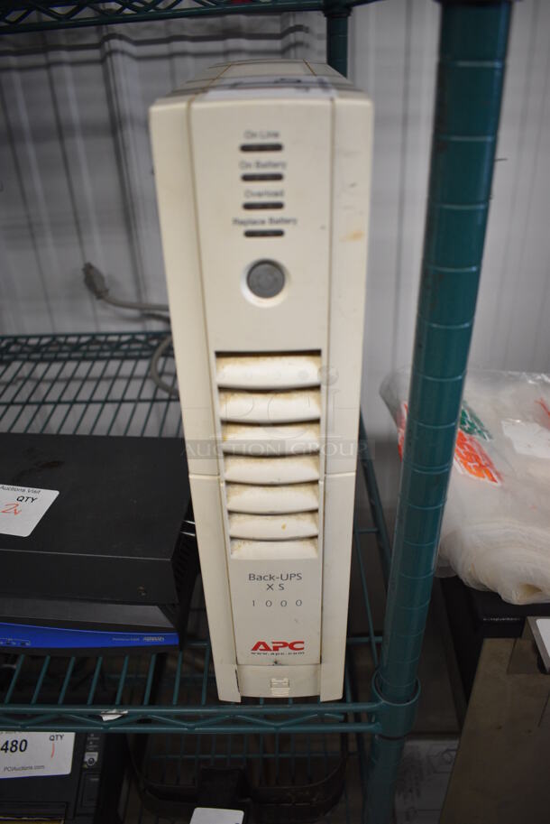 APC Back-UPS XS 1000 Uninterruptible Power Supply. 3.5x13x15.5 - Image 1 of 5