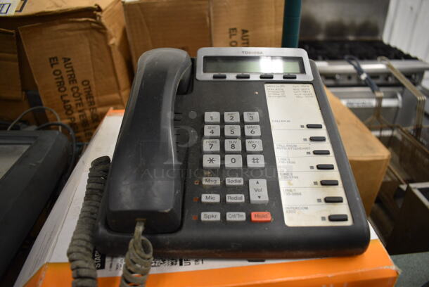 2 Corded Office Telephones. Includes Toshiba Model DKT3207-SD. 8x10x4. 2 Times Your Bid!