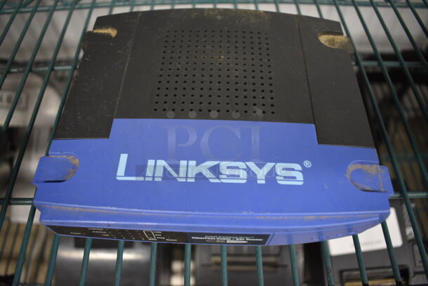 3 Various Items; Netgear Fast Ethernet Switch and 2 Linksys EtherFast Cable DSL. 7x6x2, 4x4x1. 3 Times Your Bid! - Image 6 of 7
