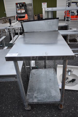 Stainless Steel Commercial Table w/ Metal Undershelf and Backsplash on Commercial Casters. 24x36x48