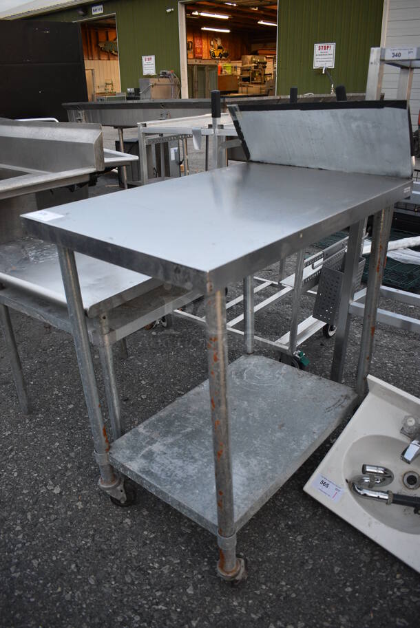 Stainless Steel Commercial Table w/ Metal Undershelf and Backsplash on Commercial Casters. 24x36x48 - Image 2 of 4