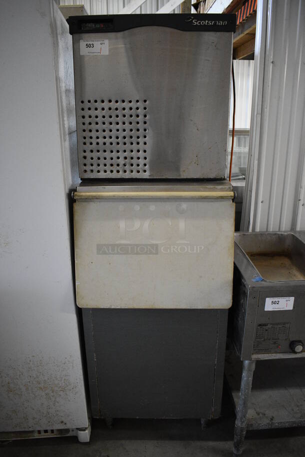SWEET! Manitowoc Model C052SA-1A Stainless Steel Commercial Air Cooled Ice Machine Head on Manitowoc Metal Commercial Ice Bin. 115 Volts, 1 Phase. 22.5x33x69
