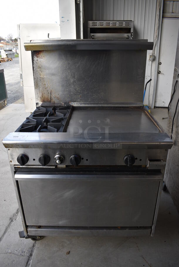 GREAT! Tri Star Stainless Steel Commercial Natural Gas Powered 2 Burner Range w/ Right Side Flat Top Griddle, Lower Oven and Stainless Steel Overshelf on Commercial Casters. 36x32x57  - Image 1 of 7