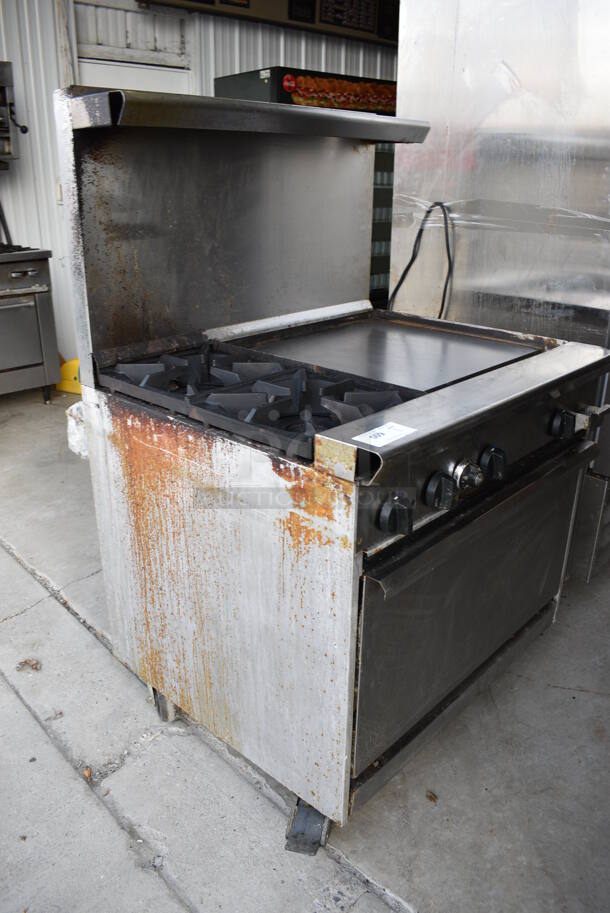 GREAT! Tri Star Stainless Steel Commercial Natural Gas Powered 2 Burner Range w/ Right Side Flat Top Griddle, Lower Oven and Stainless Steel Overshelf on Commercial Casters. 36x32x57  - Image 3 of 7