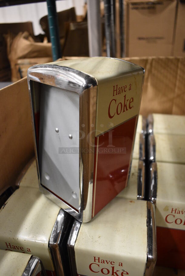 13 Metal Red and White Coke Napkin Dispensers. 4x4x7.5. 13 Times Your Bid!