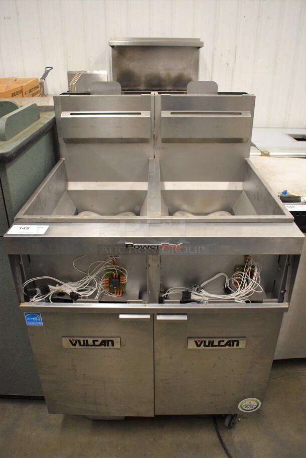 APPEARS TO BE NEW! AMAZING! Vulcan Model 2VK45DC Stainless Steel Commercial Floor Style Gas Powered 2 Bay Deep Fat Fryer w/ Filtration System on Commercial Casters. Missing Control Panel. 31x30x48