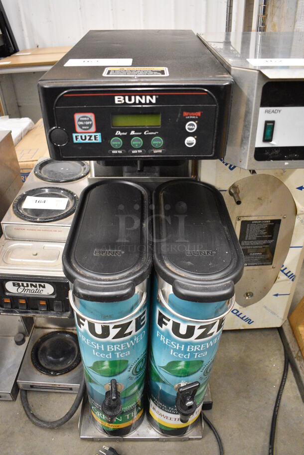 NICE! 2009 Bunn Model ITCB-DV Stainless Steel Commercial Countertop Iced Tea Machine w/ 2 Beverage Holder Dispensers. 120 Volts, 1 Phase. 10x24x34