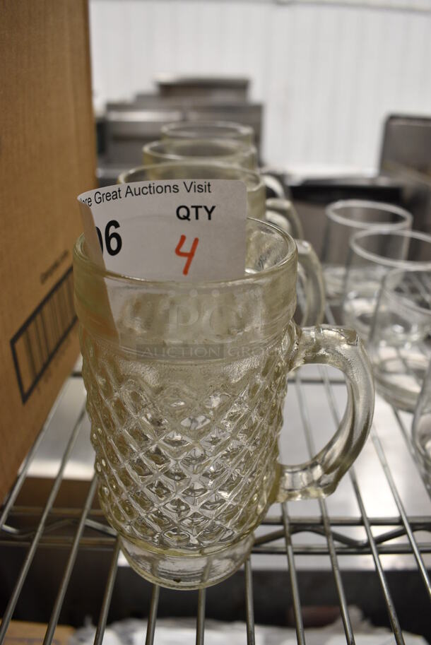4 Glass Mugs. 4.5x3x6. 4 Times Your Bid! - Image 1 of 2