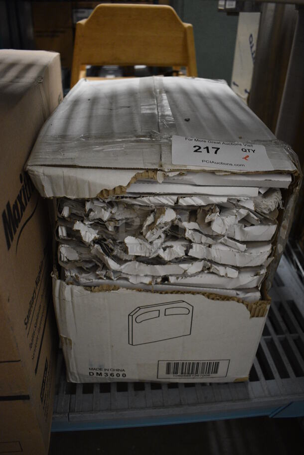 Box of DM3600 Toilet Seat Covers. 