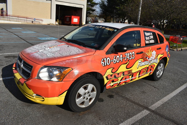 2007 Dodge Caliber 4 Door Hatchback. Has Brand New Battery Installed. VIN 1B3HB28B27D231808. Odometer Reads 102,150. Vehicle Runs and Drives! Title Is Free and Clear. See Lot 10 For Additional Pictures! - Image 1 of 12