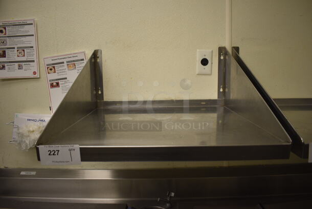 Stainless Steel Wall Mount Shelf. BUYER MUST REMOVE. 24x24x12 - Image 1 of 3
