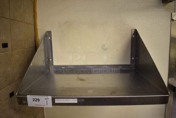Stainless Steel Wall Mount Shelf. BUYER MUST REMOVE. 24x24x12 - Image 1 of 3