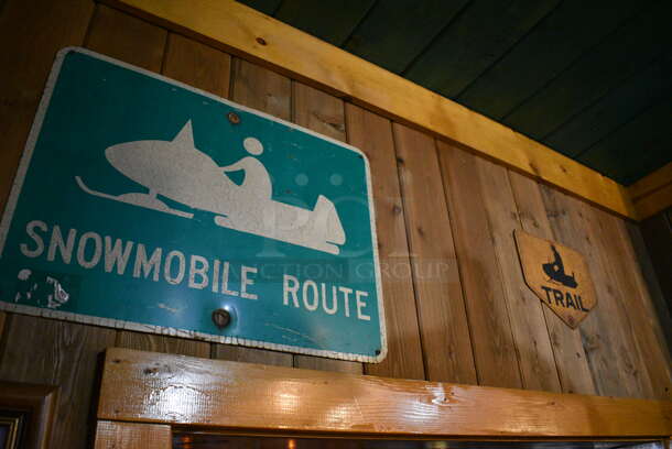 ALL ONE MONEY! Lot of Various Wall Decorations Including 5 Pictures; Skiing Picture, Black and White Dining Room Picture, Snowmobile Route Sign, Trail Sign and Winter Scene! BUYER MUST REMOVE - Image 4 of 5