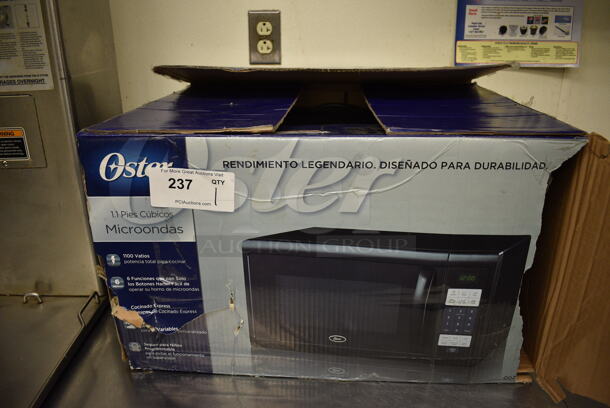 IN ORIGINAL BOX! Oster Countertop Microwave. 21x16x12 - Image 5 of 5