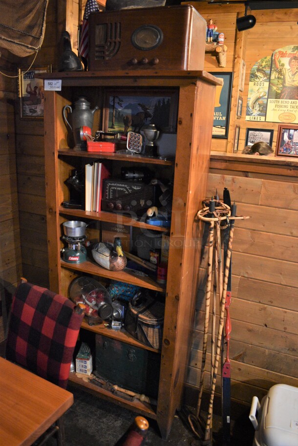 ALL ONE MONEY! Lot of Wooden Shelving Unit w/ Knickknacks and Fishing Rods! BUYER MUST REMOVE. 