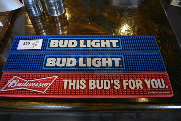 3 Bar Mats; 2 Blue Bud Light and 1 Red Budweiser. 24x3.5x0.5. 3 Times Your Bid!