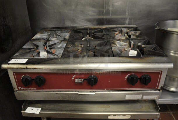 GREAT! Southbend Stainless Steel Commercial Countertop Gas Powered 6 Burner Range. BUYER MUST REMOVE. 37x32x15. Unit Was Working When Restaurant Closed!