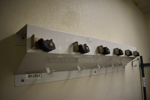 Excell Wall Mount Cleaning Tool Holder. BUYER MUST REMOVE. 34x4x7 - Image 1 of 3