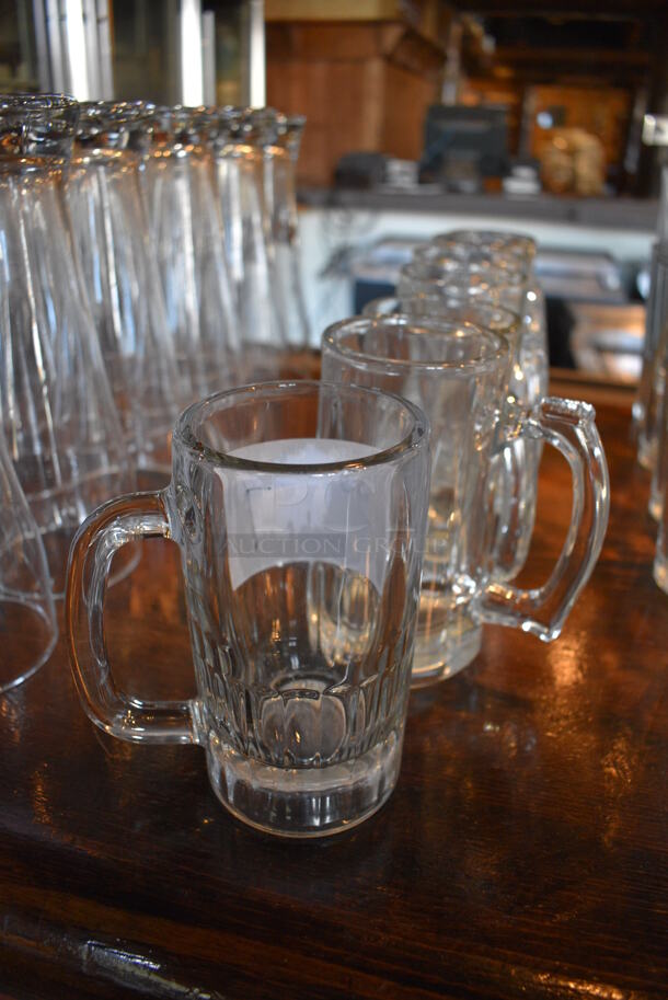 7 Glass Mugs. 4.5x3x5.5. 7 Times Your Bid! - Image 1 of 2