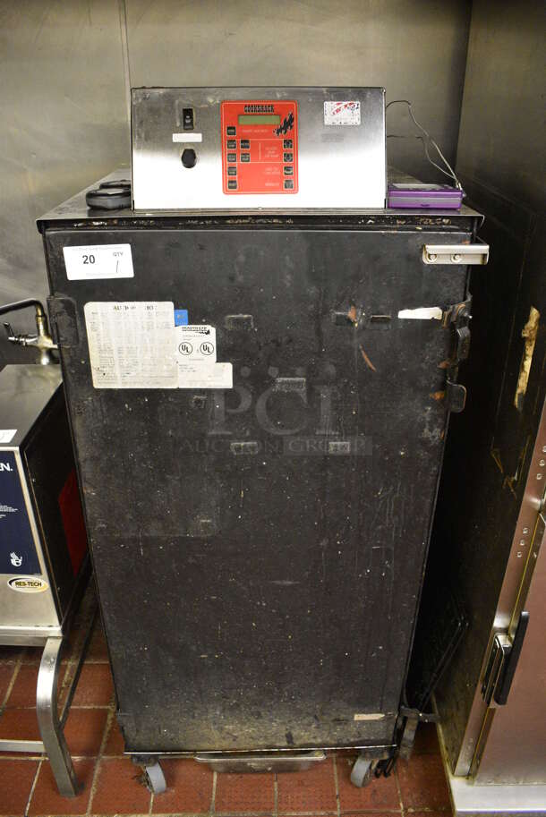 SWEET! Cookshack Model 250 Metal Commercial Electric Powered Smoker w/ Metal Racks on Commercial Casters. 240 Volts. 26.5x27x63. Unit Was Working When Restaurant Closed! - Image 1 of 8