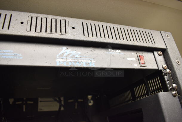 4 Rack Units in Black Metal Holder; Middle Atlantic Model PD-915R Power Center, TOA Model BG-130 Integrated Amplifier, QSC Model ISA 500Ti Professional Amplifier and Lowell. BUYER MUST REMOVE. 22x24x28 - Image 3 of 7