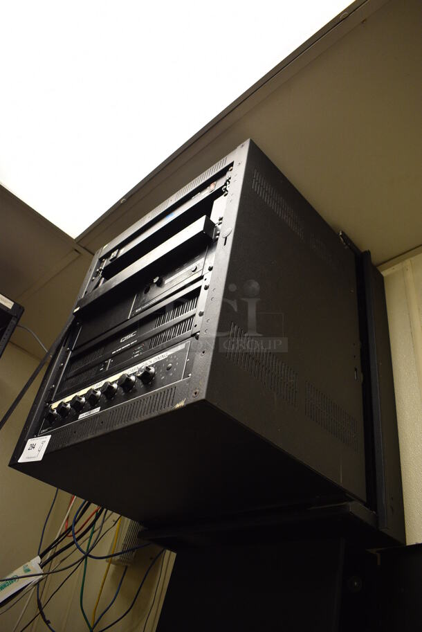4 Rack Units in Black Metal Holder; Middle Atlantic Model PD-915R Power Center, TOA Model BG-130 Integrated Amplifier, QSC Model ISA 500Ti Professional Amplifier and Lowell. BUYER MUST REMOVE. 22x24x28 - Image 7 of 7