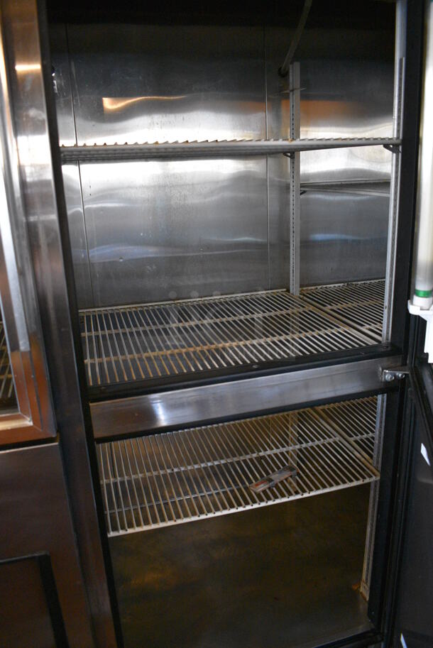WOW! 2005 True Model TS-72-3-G-3 Stainless Steel Commercial 6 Half Size Door Reach In Cooler w/ Poly Coated Racks on Commercial Casters. 115 Volts, 1 Phase. 78x30x83 - Image 5 of 6