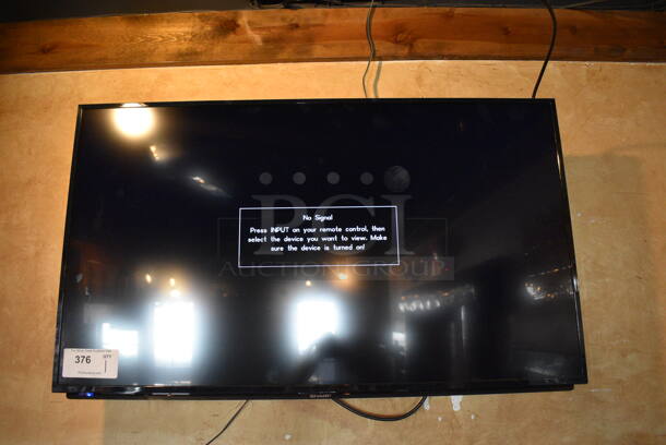 Sharp 42" Television. BUYER MUST REMOVE. We Will Not Ship This Item. Tested and Working! - Image 1 of 3