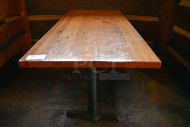 Wooden Table on 2 Black Straight Leg Table Bases. 66x30x30