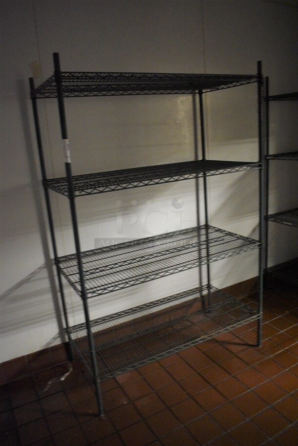 Green Finish 4 Tier Metro Style Shelving Unit. BUYER MUST DISMANTLE. PCI CANNOT DISMANTLE FOR SHIPPING. PLEASE CONSIDER FREIGHT CHARGES. 48x24x74