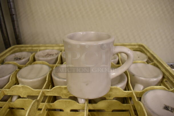 12 White Ceramic Mugs in Dish Caddy. 4.5x3.5x4. 12 Times Your Bid!