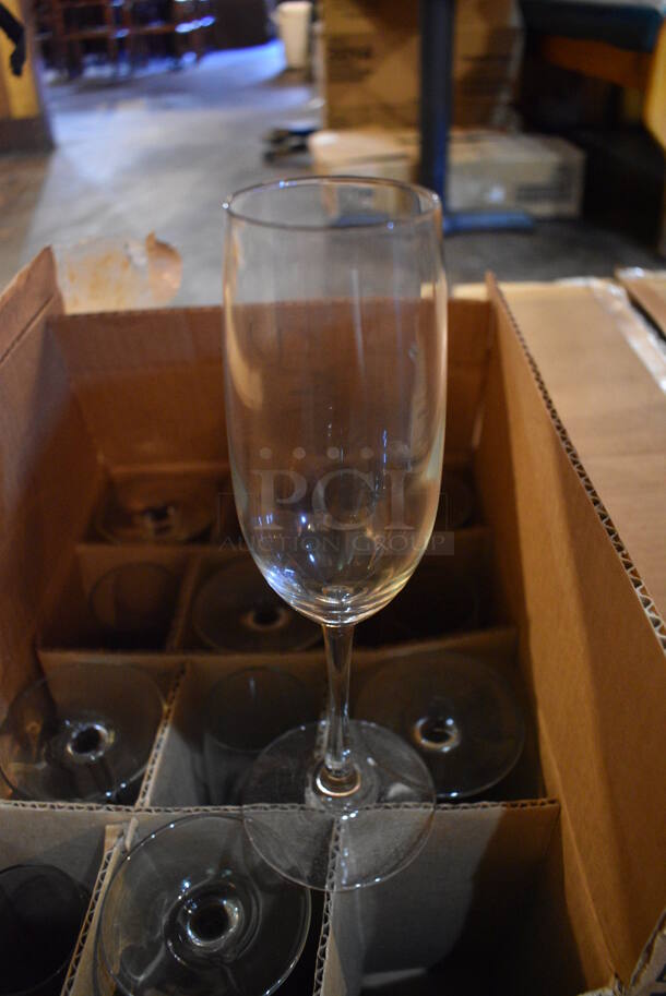 12 BRAND NEW IN BOX! Champagne Glasses. 3x3x9. 12 Times Your Bid!