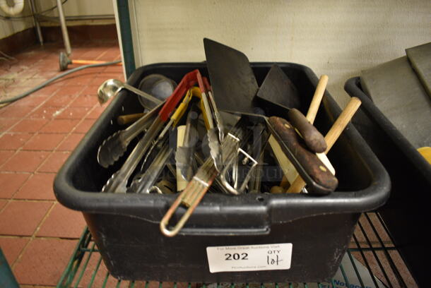 ALL ONE MONEY! Lot of Various Metal Utensils Including Spatulas and Tongs in Black Poly Bus Bin!