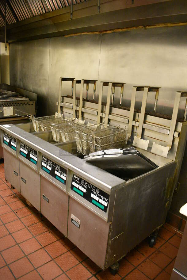 GORGEOUS! Pitco Frialator Stainless Steel Commercial Floor Style Gas Powered 4 Bay Deep Fat Fryer w/ Filtration System, 8 Metal Fry Baskets and 4 Metal Lids on Commercial Casters. 110,000 BTU. 62.5x39x55. Unit Was Working When Restaurant Closed! - Image 2 of 10