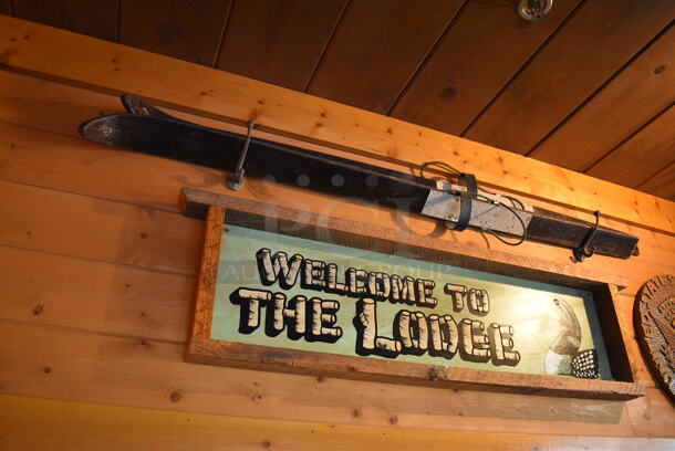 ALL ONE MONEY! Lot of Wall Decorations Including Welcome to the Lodge Sign, Bag, Walking Stick, United States of America Sign and Basket. BUYER MUST REMOVE - Image 4 of 7