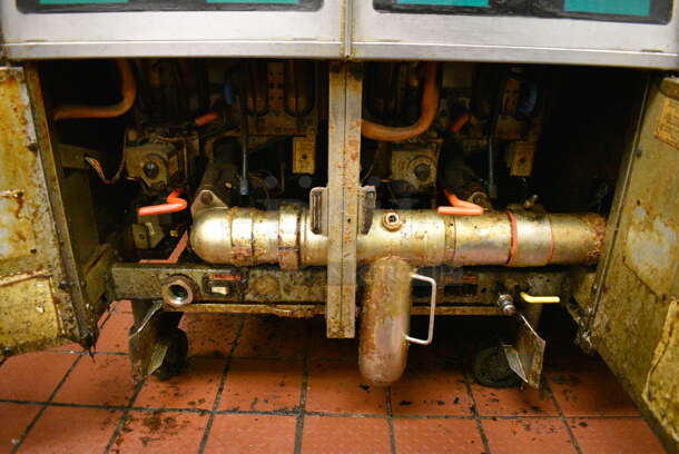 GORGEOUS! Pitco Frialator Stainless Steel Commercial Floor Style Gas Powered 4 Bay Deep Fat Fryer w/ Filtration System, 8 Metal Fry Baskets and 4 Metal Lids on Commercial Casters. 110,000 BTU. 62.5x39x55. Unit Was Working When Restaurant Closed! - Image 7 of 10