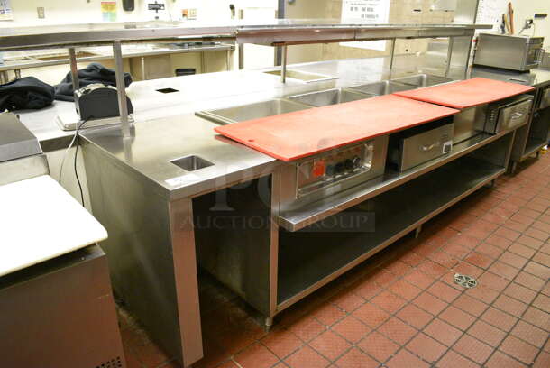 AMAZING! Stainless Steel Commercial Work Station w/ 4 Steam Well Bays, 2 Warming Drawers, 2 Cold Wells and Undershelves. BUYER MUST REMOVE. 283x72x53. Unit Was Working When Restaurant Closed!